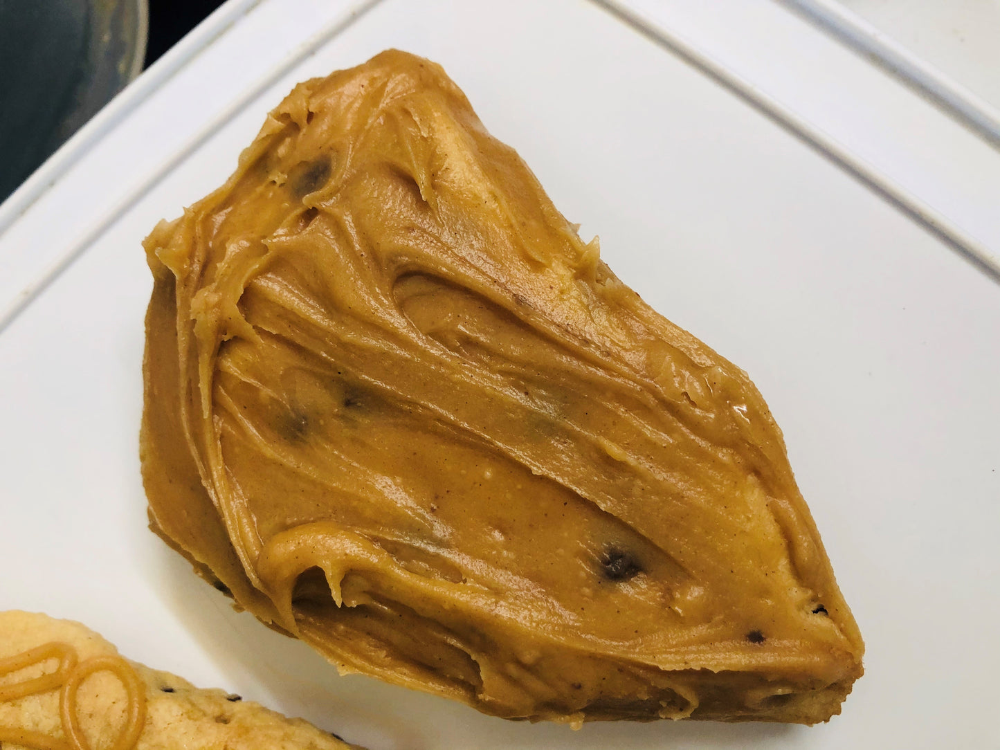 Heavenly Delicious Peanut Butter Chocolate Chip Scones with Peanut Butter Glaze