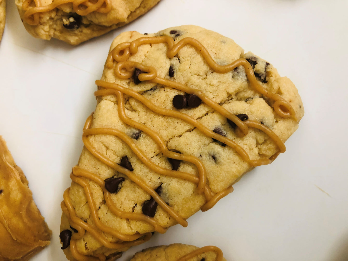 Heavenly Delicious Peanut Butter Chocolate Chip Scones with Peanut Butter Glaze